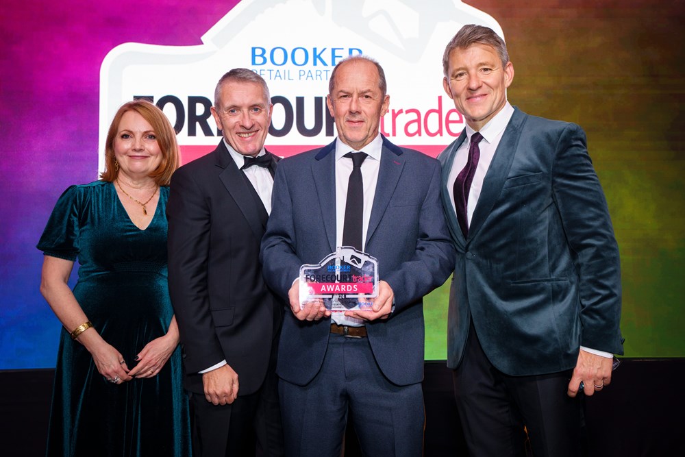 Pictured here (l to r) Forecourt Trader’s editor Juliet Morrison, Booker Retail Partner’s managing director Colm Johnson, MFG's Rob Mansell and TV presenter Ben Shephard.|Wheel2Win POS|Wheel2Win-POS-scaled-aspect-ratio-315-195|Pictured-here-l-to-r-Forecourt-Traders-editor-Juliet-Morrison-Booker-Retail-Partners-managing-director-Colm-Johnson-MFGs-Rob-Mansell-and-TV-presenter-Ben-Shephard-aspect-ratio-315-195